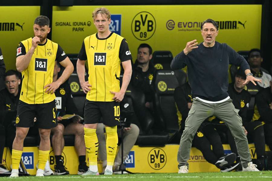 Salih Özcan (l.), Julian Brandt (M.) und BVB-Coach Niko Kovac (r.)
