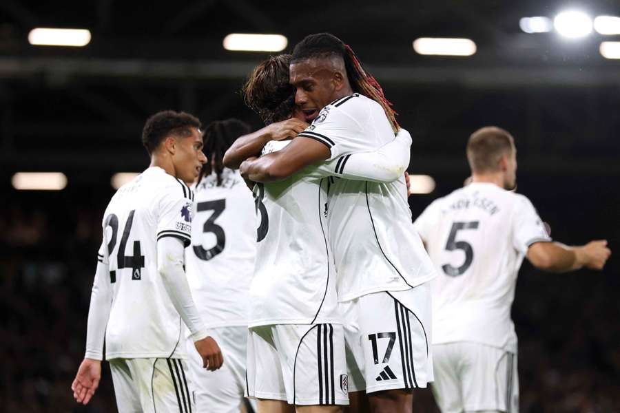 Harry Wilson of Fulham celebrates scoring his team's second goal with teammate Alex Iwobi 