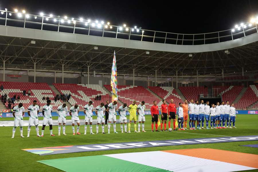 Republic of Ireland players bow their heads and wear black armbands in recognition of all lives lost in the Gaza conflict during the national anthems Republic of Ireland players bow their heads and wear black armbands in recognition of all lives lost in the Gaza conflict during the national anthems