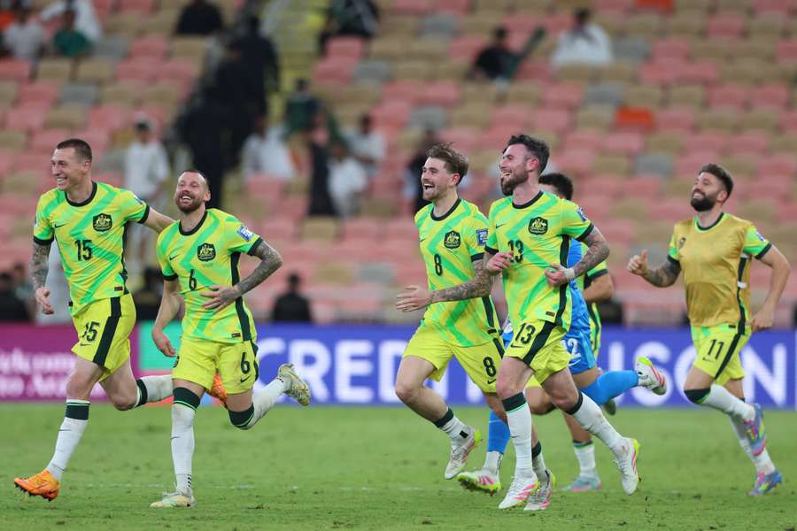 Australia's players celebrate their 2-1 win over Saudi Arabia in Riyadh. 