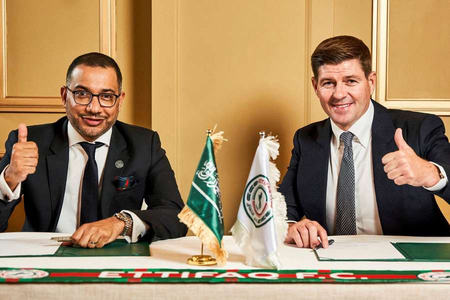 Steven Gerrard (R) signing on with Al-Ettifaq