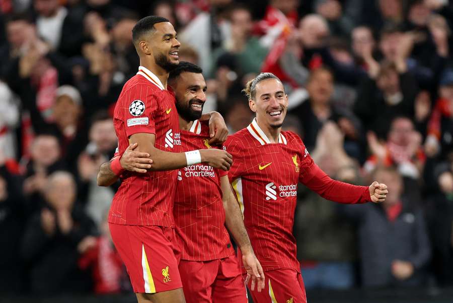 Liverpool's Mohamed Salah with teammates Cody Gakpo and Kostas Tsimikas