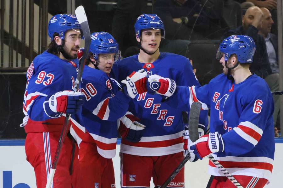 New York Rangers players celebrating a goal against the Boston Bruins (2025)
