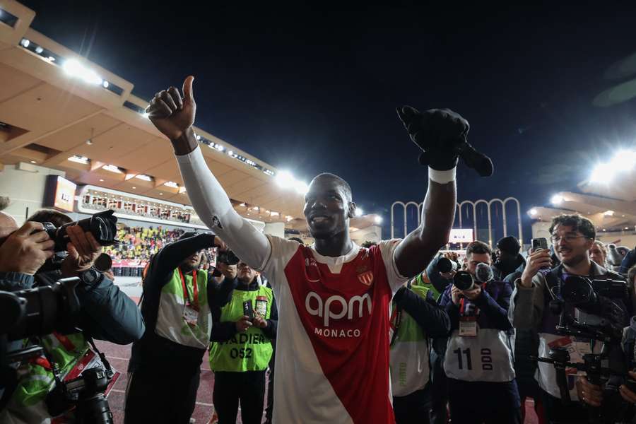 Paul Pogba gestures to supporters at the end of the match