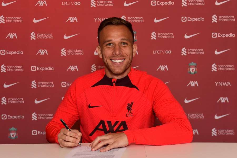 Liverpool reinforce depleted midfield with Arthur loan from Juventus