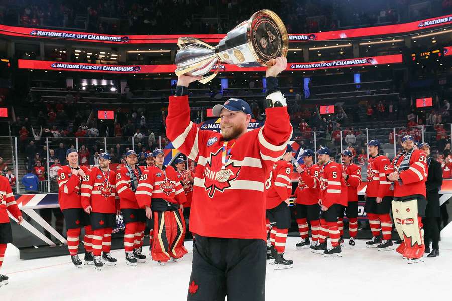Sam Bennett lifts the 4 Nations Face-Off Championship trophy