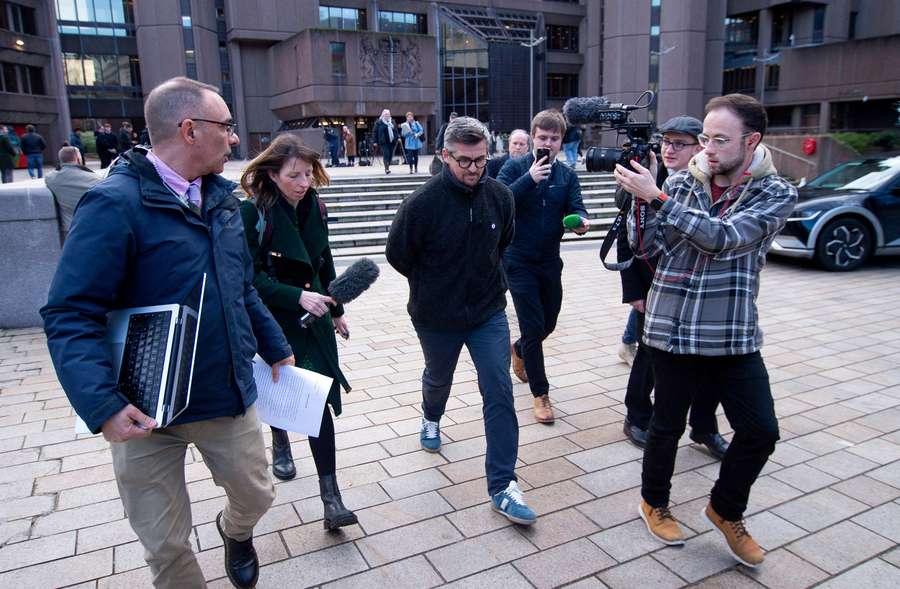 Joey Barton leaves Liverpool Crown Court after sentencing following his guilty verdict for online harassment in December 2025