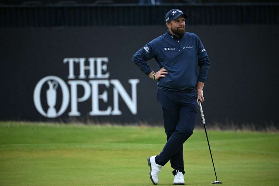 Ireland's Shane Lowry takes a two-shot lead into the third round of the British Open