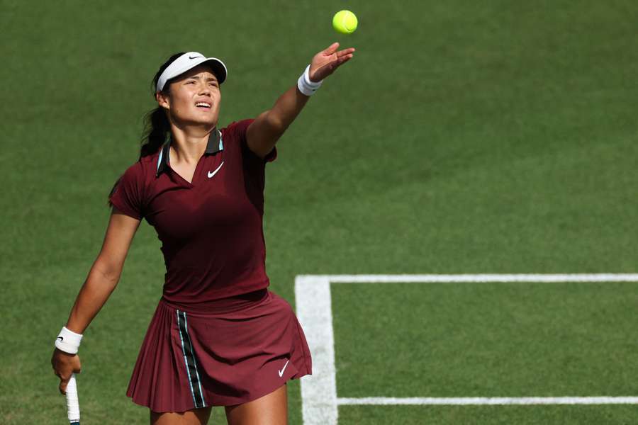 Britain's Emma Raducanu serves to Australia's Maya Joint