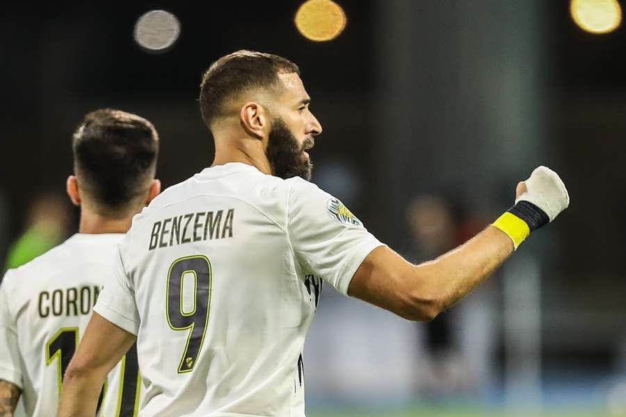 Karim Benzema celebrates scoring on his debut for Al-Ittihad