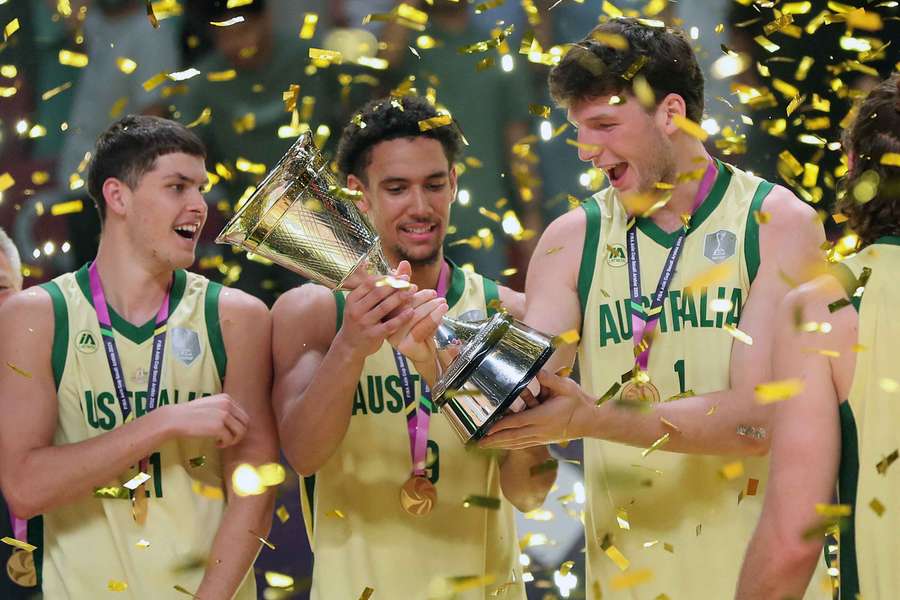 Boomers players are awarded the FIBA Asia Cup trophy in Jeddah on Sunday evening. Boomers players are awarded the FIBA Asia Cup trophy in Jeddah on Sunday evening.