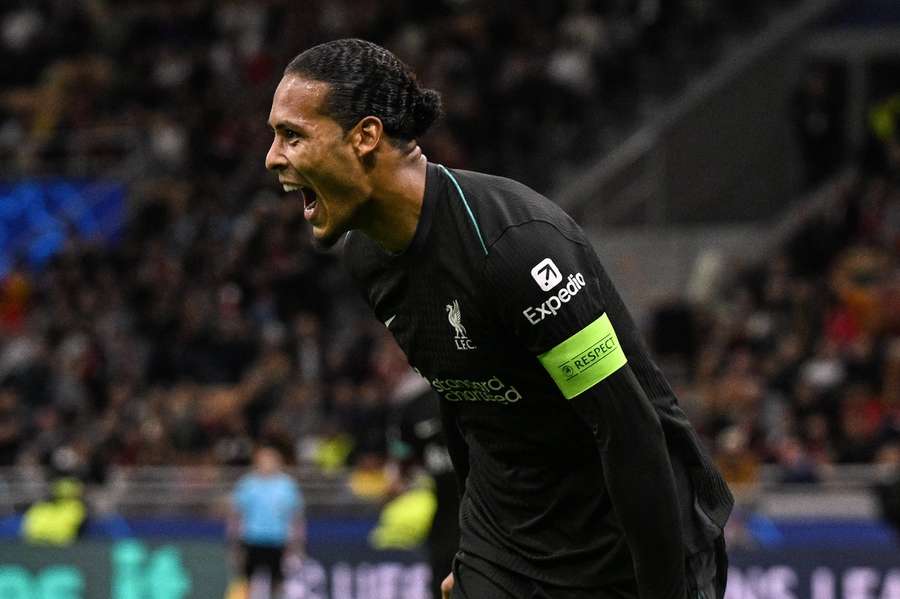 Virgil van Dijk celebrates scoring Liverpool's second goal