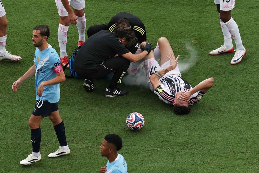 Nicolo Savona receives treatment after sustaining his injury