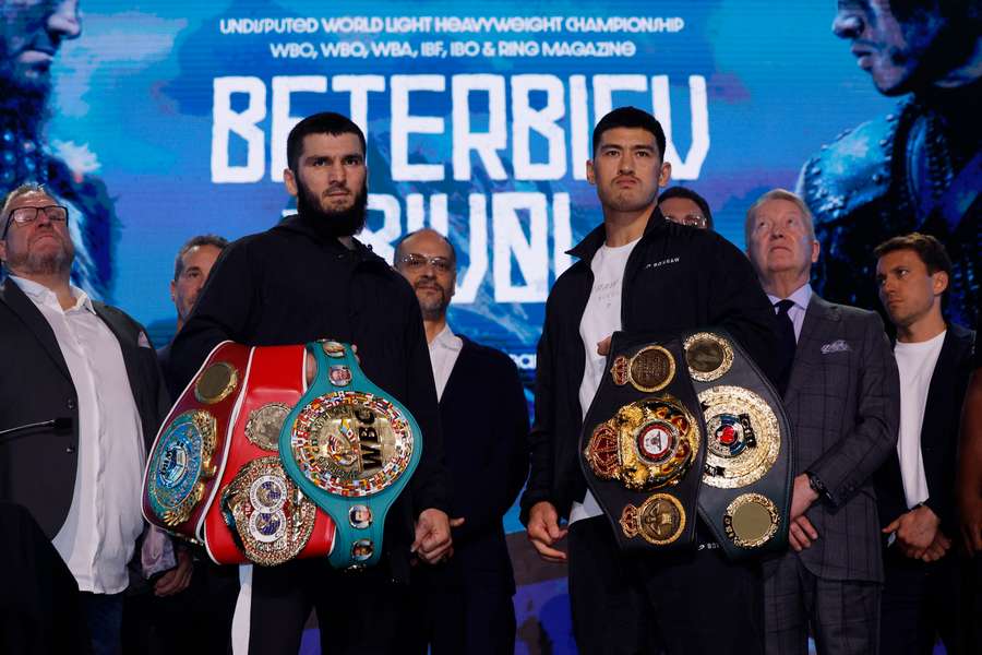 Artur Beterbiev and Dmitry Bivol pose during the press conference