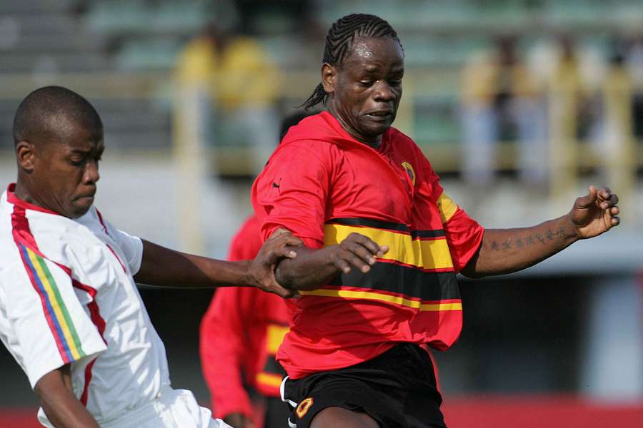 Akwa (R) believes his nation can still secure World Cup qualification