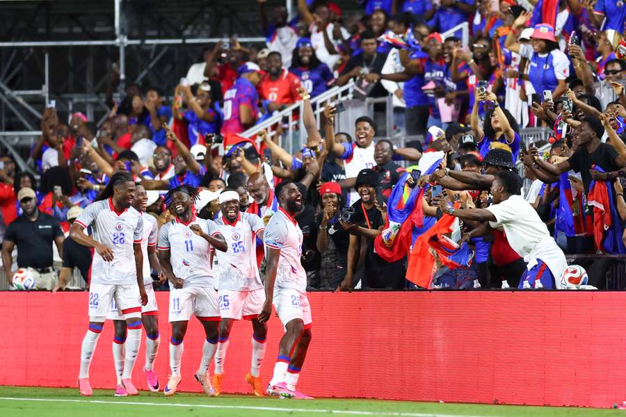 Haiti players and supporters celebrate one of their four goals in Fort Lauderdale. Haiti players and supporters celebrate one of their four goals in Fort Lauderdale.