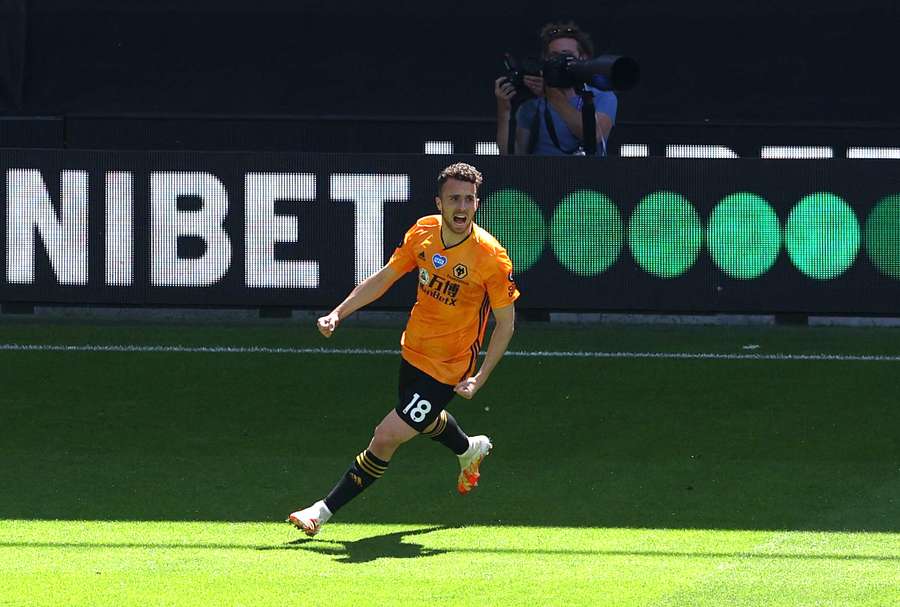 Jota celebrates his final goal for Wolves in a 3-0 win over Everton, 2020