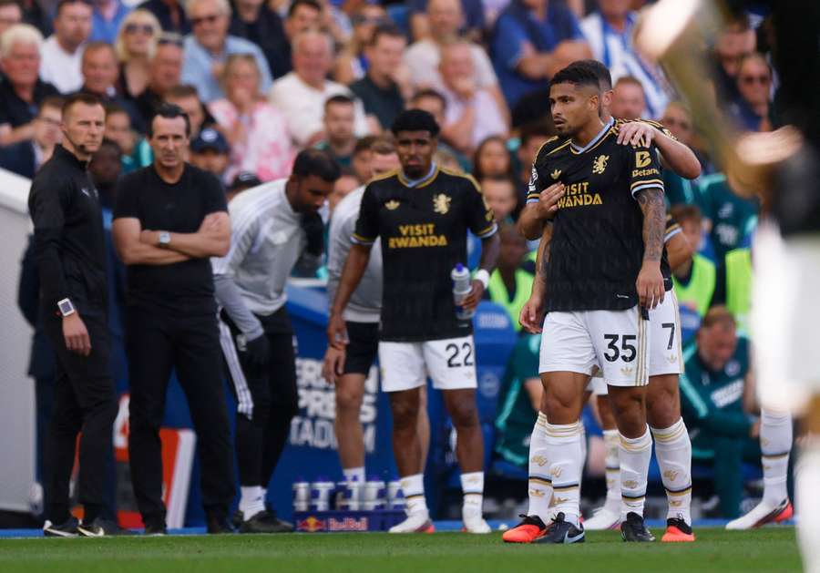 Aston Villa's Joao Gomes reacts after being shown a red card Aston Villa's Joao Gomes reacts after being shown a red card