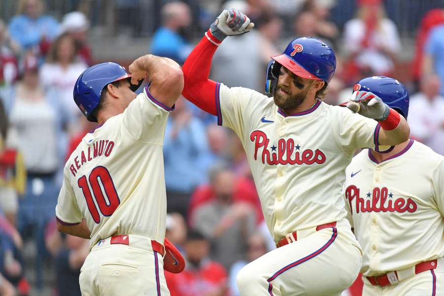 Philadelphia Phillies first base Bryce Harper celebrates his three-run home run