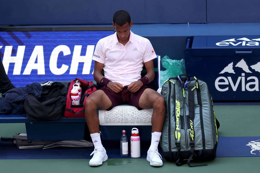 Canada's Felix Auger-Aliassime looks dejected after losing his second round match against Russia's Karen Khachanov