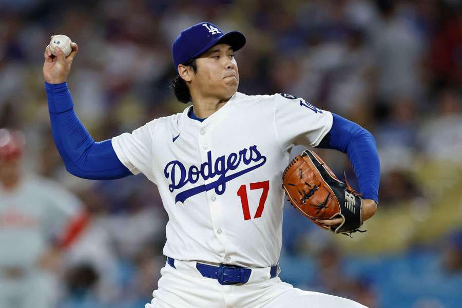 Los Angeles Dodgers' Shohei Ohtani throws a pitch against the Phillies (2025)