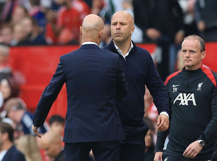 Slot and Ten Hag embrace