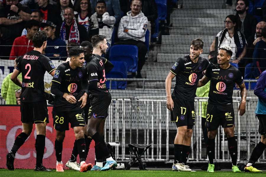 Toulouse celebrate Ratao's equaliser in the 67th minute