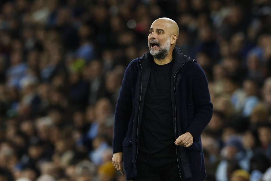 Pep Guardiola reacts