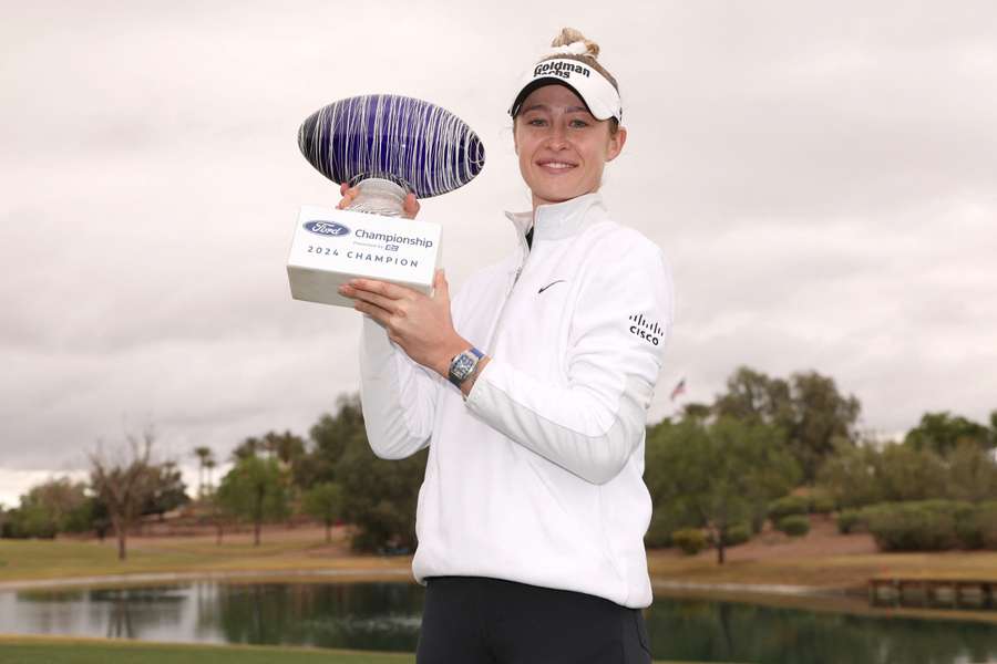 Korda poses with her trophy