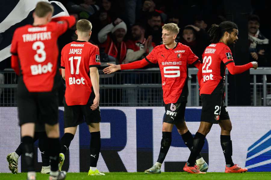 Les Rennais célébrant le 1-0.