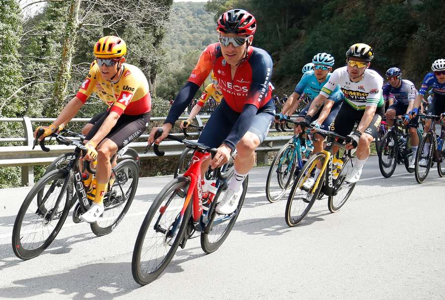 Team Ineos' British rider Ethan Hayter and Team Jumbo-Visma’s Slovenian rider Primoz Roglic compete