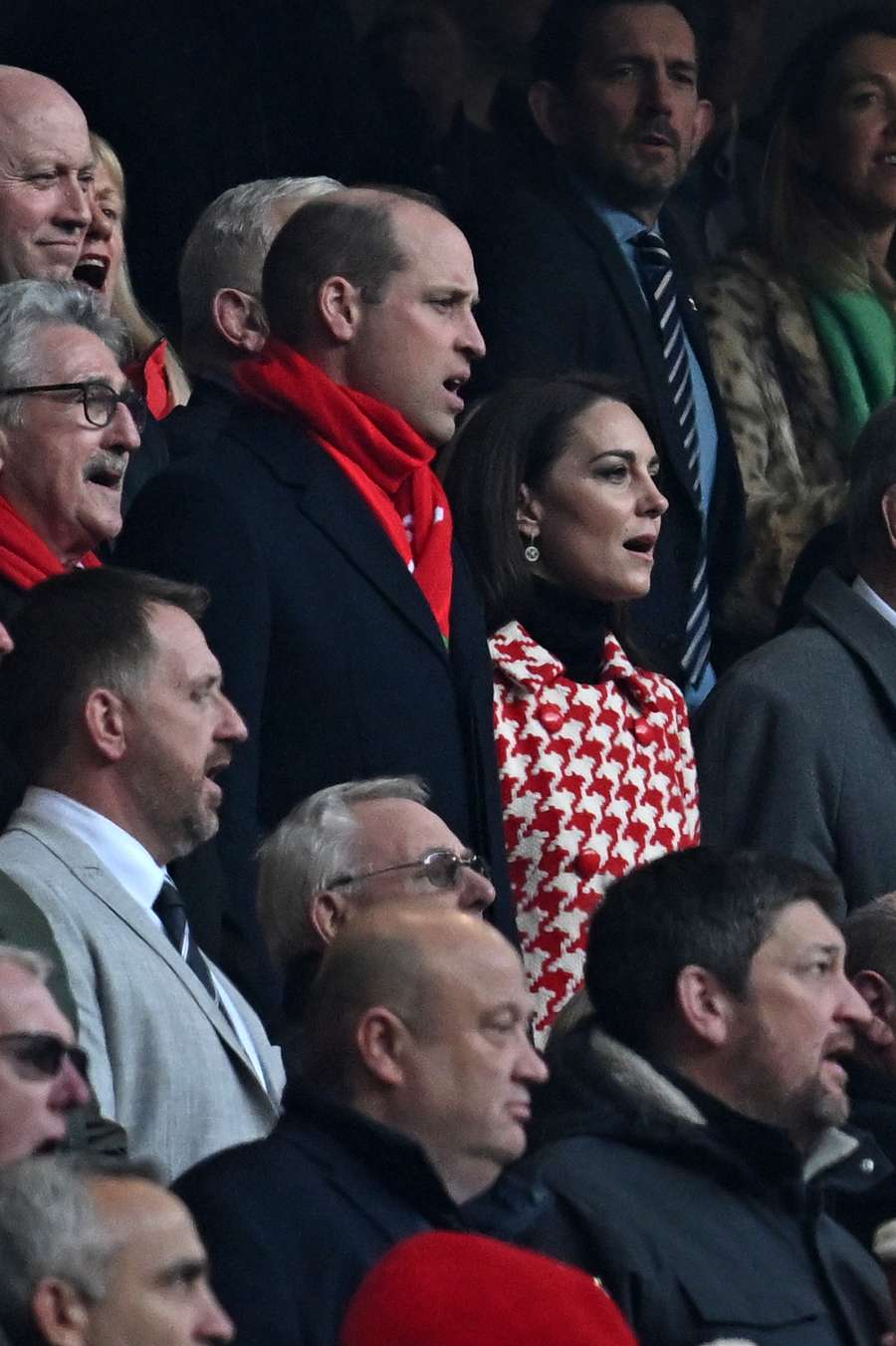 Britain's Prince William, Prince of Wales and Britain's Catherine, Princess of Wales sing the Welsh National Anthem ahead of the Six Nations match