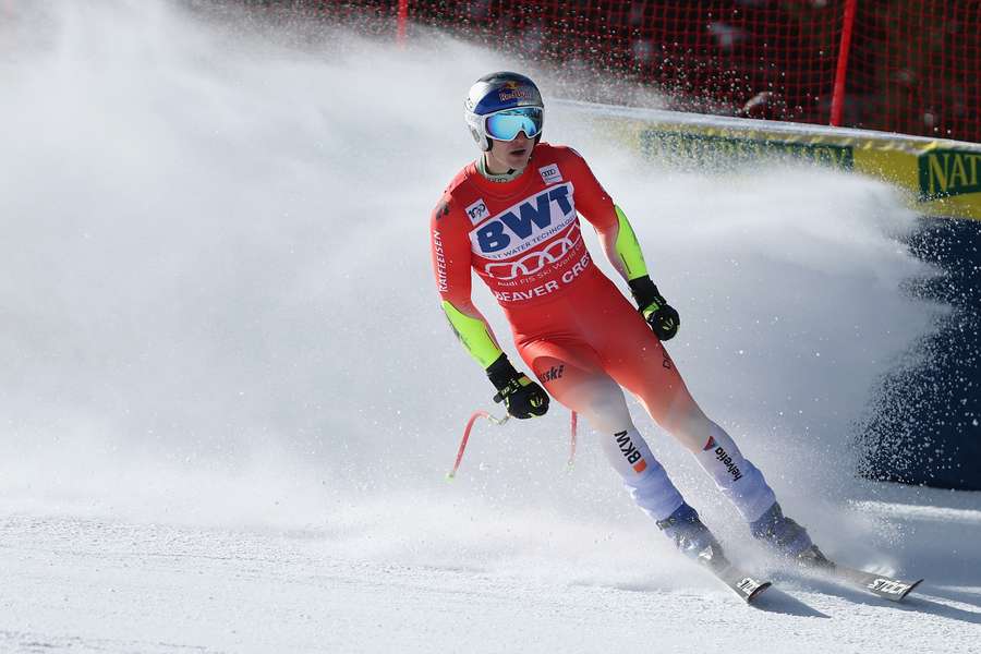Marco Odermatt crossed over the finishing line ahead of Cyprien Sarrazin