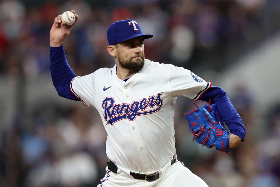 Nathan Eovaldi throwing a pitch against the Toronto Blue Jays before leaving with an injury (2025)