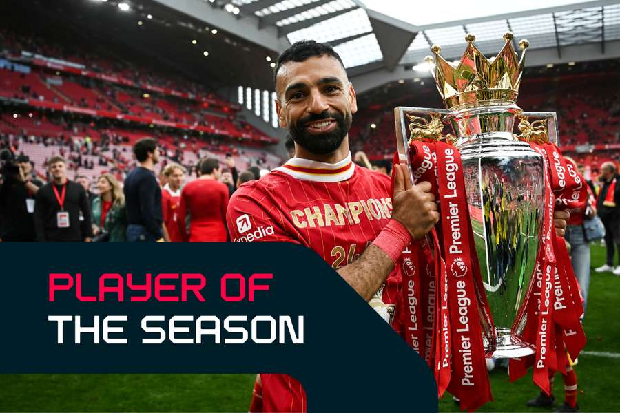 Salah poses with the Premier League trophy