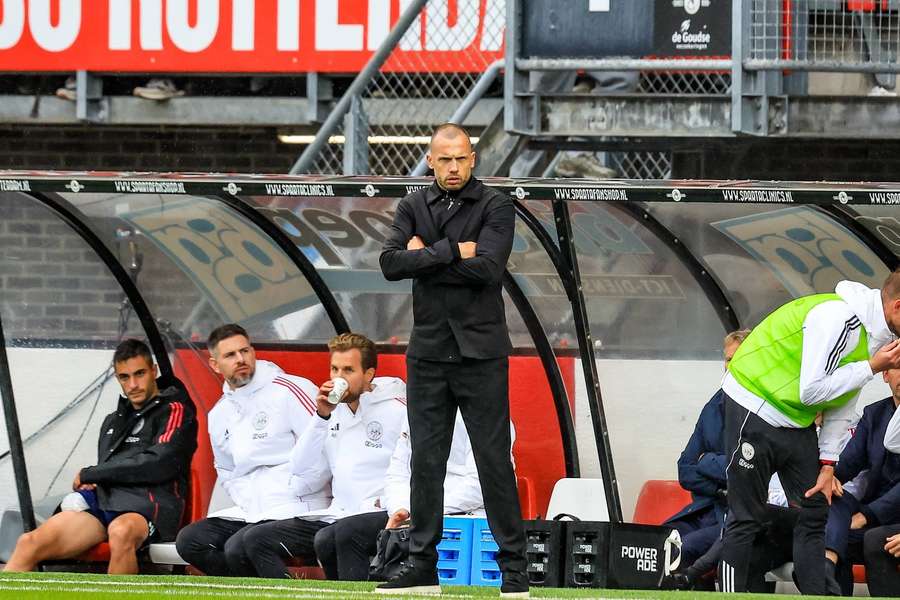 Ajax first-team coach John Heitinga is under increasing pressure