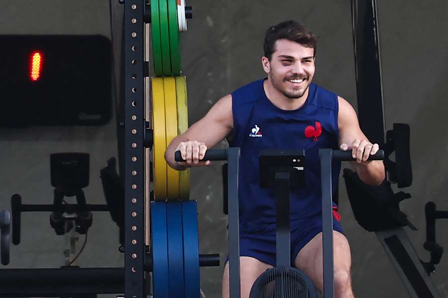 France's scrum-half and captain Antoine Dupont takes part during a training session 