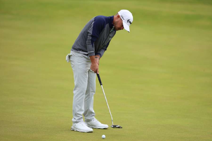 Brian Harman in action on the 18th green during the third round