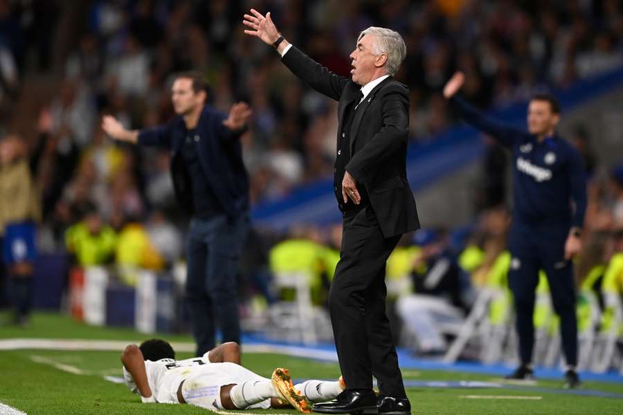 Real Madrid's Italian coach Carlo Ancelotti reacts next to Real Madrid's Brazilian forward Rodrygo