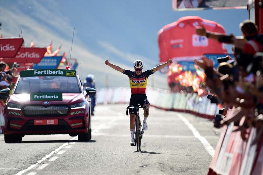 Remco Evenepoel celebrates winning stage 14