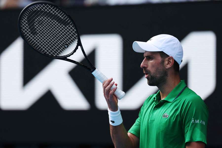 Novak Djokovic reacts during his quarter-final match against Italy's Lorenzo Musetti 