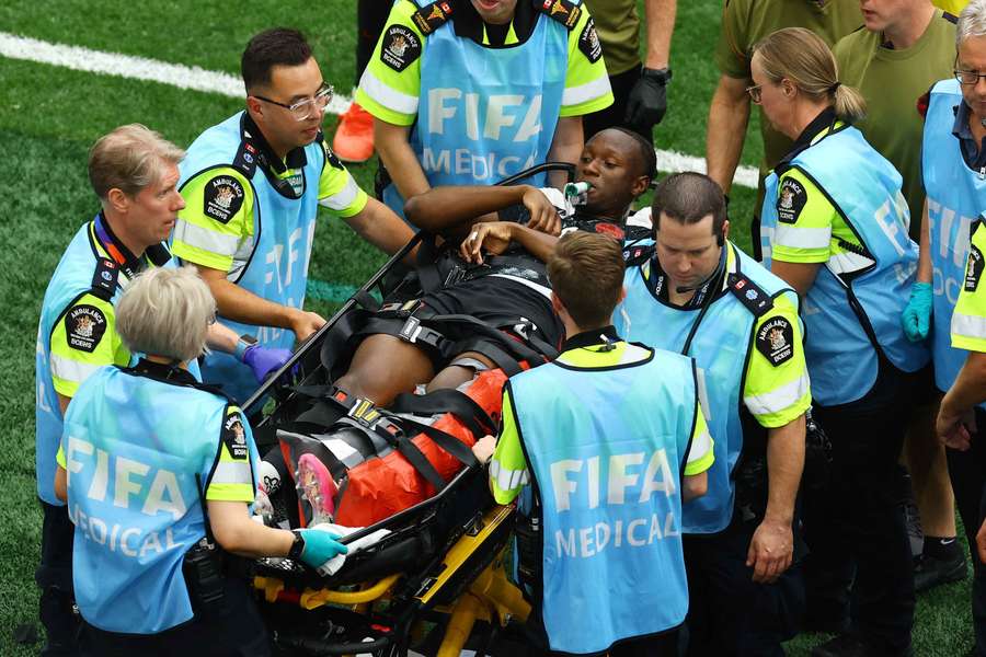Ismael Kone is stretchered off after suffering an injury against Qatar Ismael Kone is stretchered off after suffering an injury against Qatar
