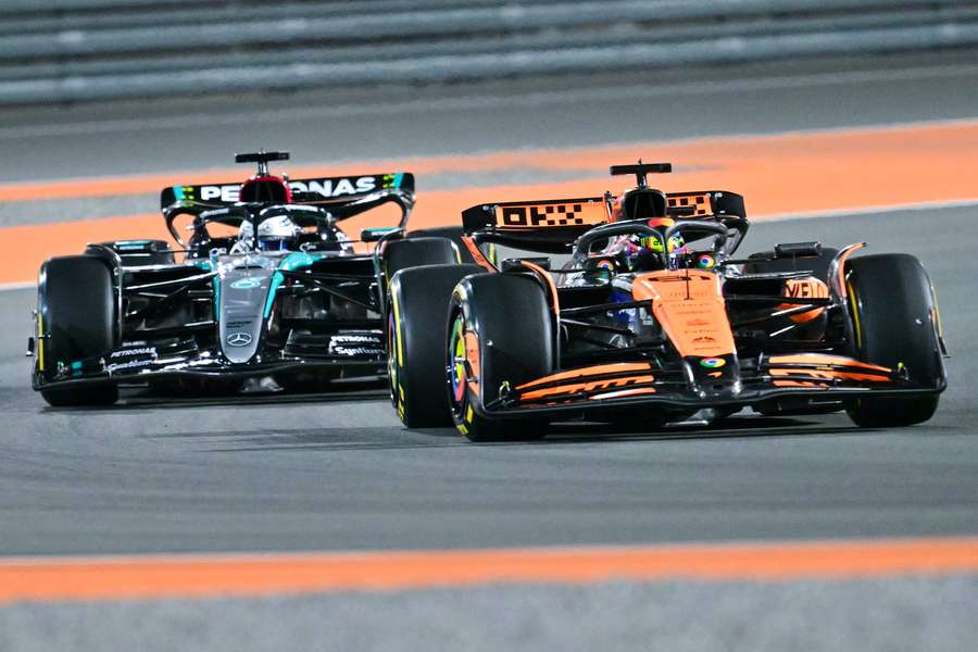 McLaren's Australian driver Oscar Piastri drives ahead of Mercedes' British driver George Russell during Saturday's sprint race