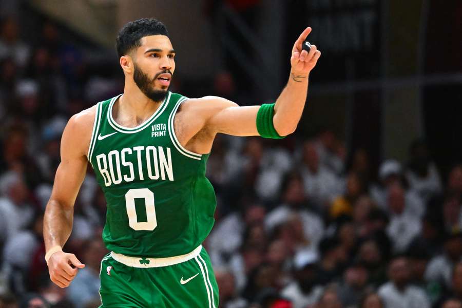 Jayson Tatum of the Boston Celtics reacts after scoring a basket against the Cleveland Cavaliers