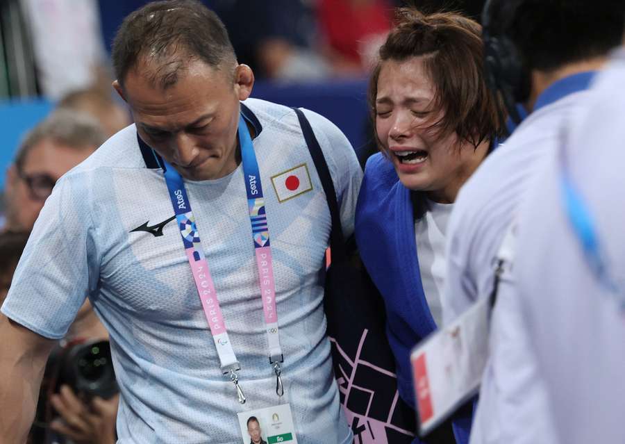 Uta Abe struggled off the mat following her defeat