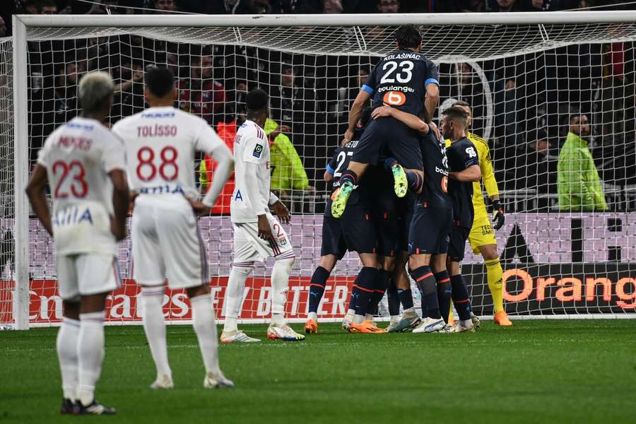 Marseille players celebrate against Lyon