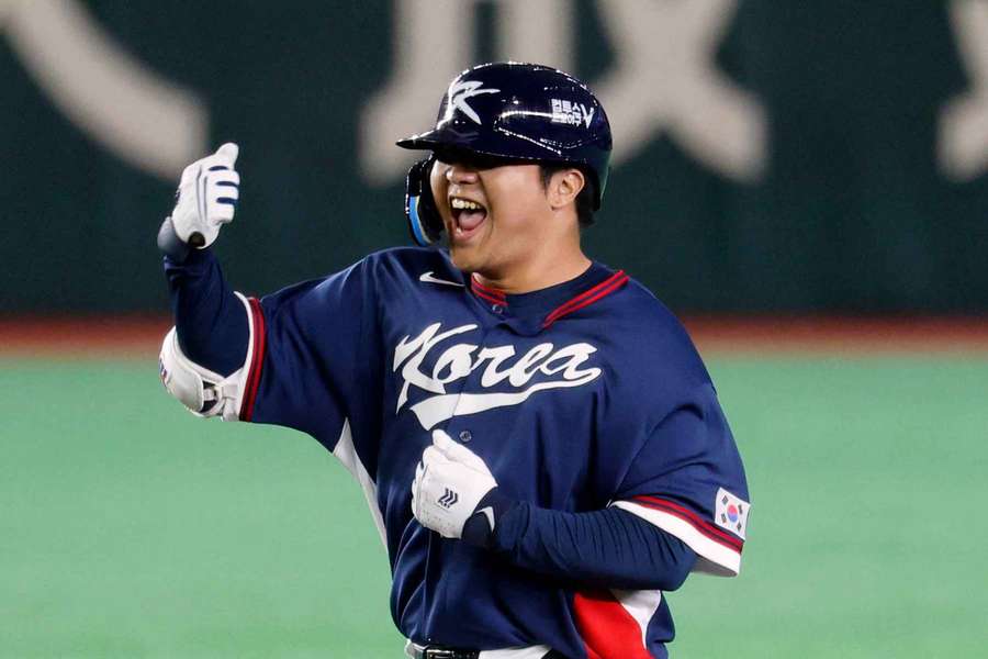 Moon Bo-Gyeong celebrates after getting a hit for South Korea Moon Bo-Gyeong celebrates after getting a hit for South Korea