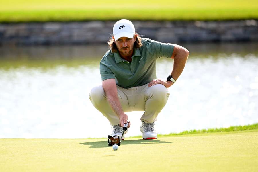 Tommy Fleetwood lines up a putt on the 17th green during the second round of the Travelers Championship on Friday