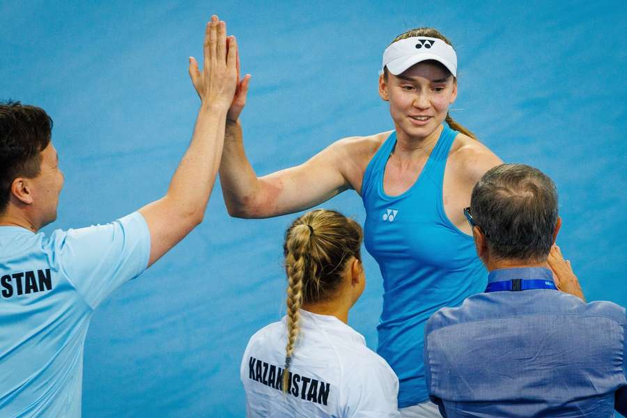 Rybakina celebrates with her team