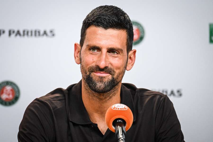 Novak Djokovic speaks to the press